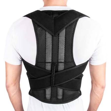 Person wearing a black posture corrector on a white background